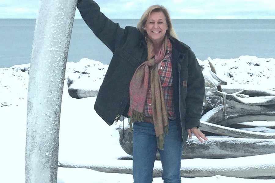 Photo: Dr. Dana Wetzel with whale bones during field research
