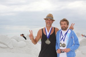 Master sand sculptors Leonardo Ugolini (left) from Forli, Italy, and Enguerrand David from Brussels, Belgium, won first prize ($5,000) for “Tender Loving Care,” a sculpture in the Siesta Key Crystal Classic, on Nov. 15 at Siesta Beach.