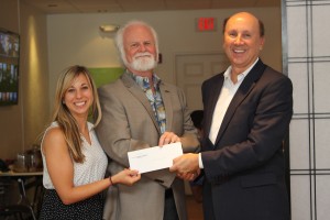 Erin Knievel and Dr. Michael P. Crosby, Mote Marine Laboratory; and Dr. Mark Pritchett, Gulf Coast Community Foundation.
(Check presented for: “Cancer Therapies from Sharks.”)
