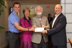 Thomas Biddinger and Nan Summers, Healthy Earth; Dr. Michael P. Crosby, Mote Marine Laboratory; and Dr. Mark Pritchett, Gulf Coast Community Foundation. 
(Check presented for: “Healthy Earth – Gulf Coast: Sustainable Seafood System.”)
