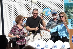 On Feb. 18, donors for Mote’s planned new facility on Summerland Key, Fla., celebrated the demolition of old buildings there with Mote leaders and scientists. From left: Leadership Donors Nancy and Rick Moskovitz, Mote President & CEO Dr. Michael P. 