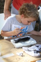 Luke DeSantis at the Gyotaku Fish Painting station at Mote Marine Laboratory’s Snook Shindig Teach-A-Kid Fishing Clinic. Gyotaku is the traditional Japanese method of printing fish, a practice that dates back to the mid-1800s.