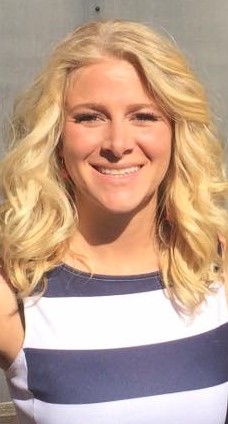 Portrait of Dr. Hanna Koch, smiling at the camera.