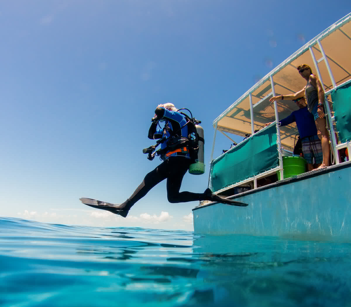 Mote scientists enter the water during a dive with members of the Combat Wounded Veteran Challenge to restore coral reefs.