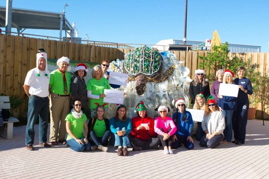 Longboat Key Turtle Watch (LBKTW) volunteers and Mote staff pose at check presentation.