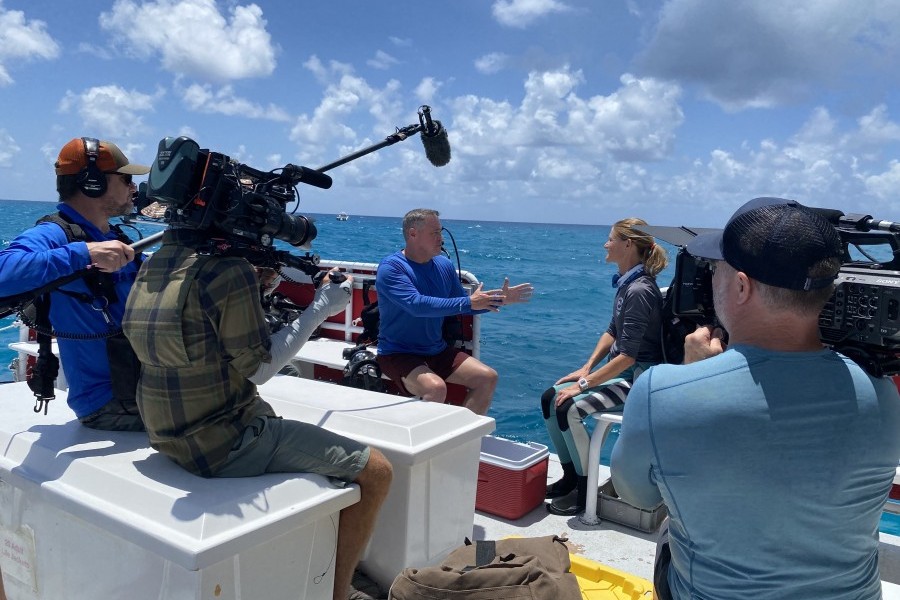 Mote staff members discuss conservation efforts with Jeff Corwin host of Wildlife Nation