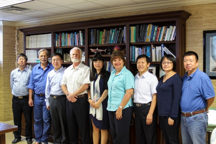 Photo: On Friday, Sept. 18, Mote Marine Laboratory research leaders greet scientists from the Yellow Sea Fisheries Research Institute and Yantai University in China, who visited Mote to share knowledge about fisheries research designed to help feed growing populations. (Credit Mote Marine Laboratory).