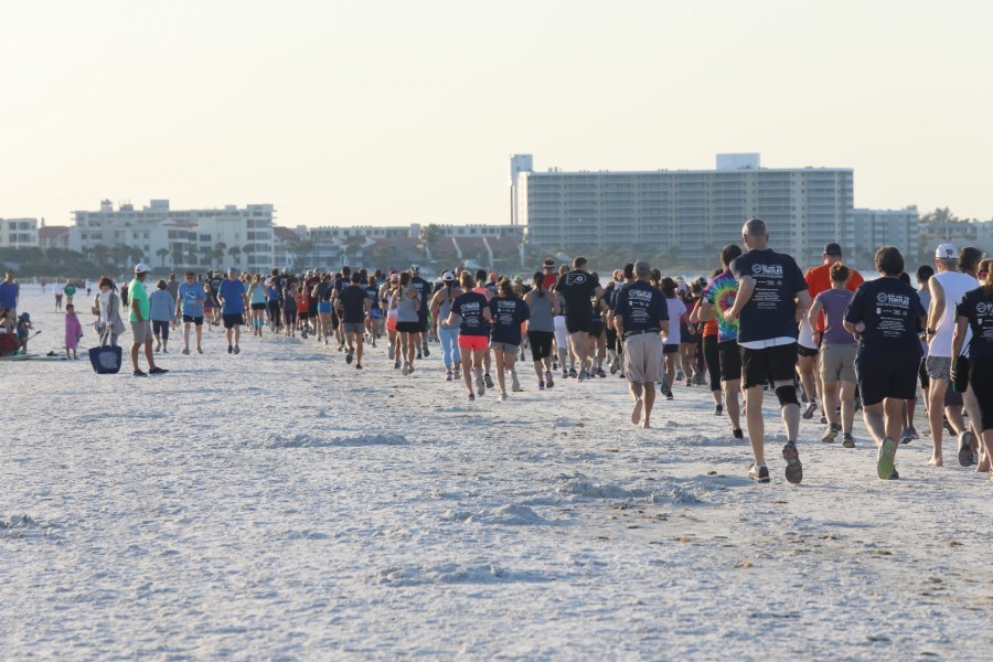 Runners and walkers on Siesta Key beach for the 33rd Annual Run for the Turtles.