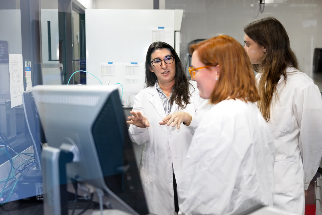 Scientists and interns in one of Mote's working labs