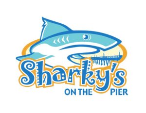 light blue shark above text "sharky's on the pier"