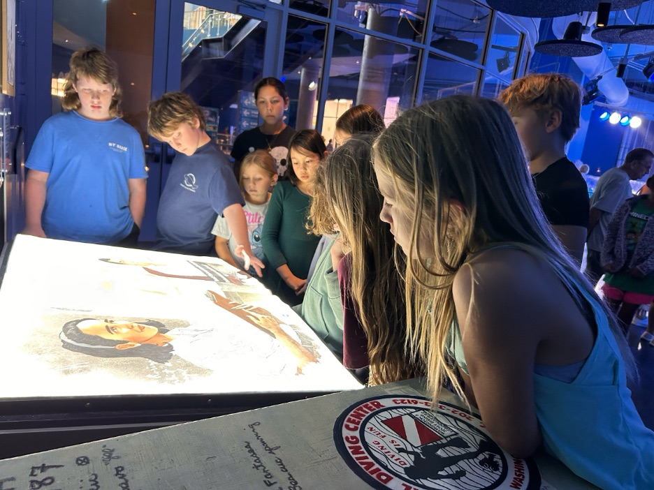 Homeschool group exploring Genie's Book